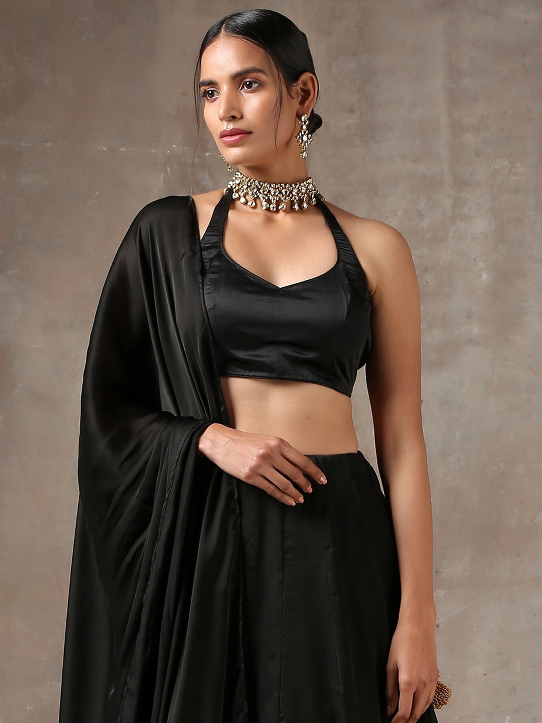 

Swtantra Women Black Solid Halter Neck Saree Blouse