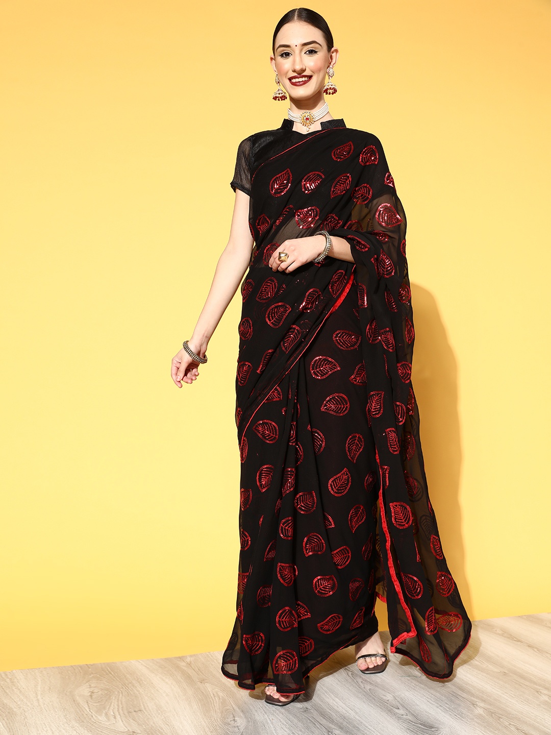 

Mitera Floral Pure Georgette Saree with Solid border, Black
