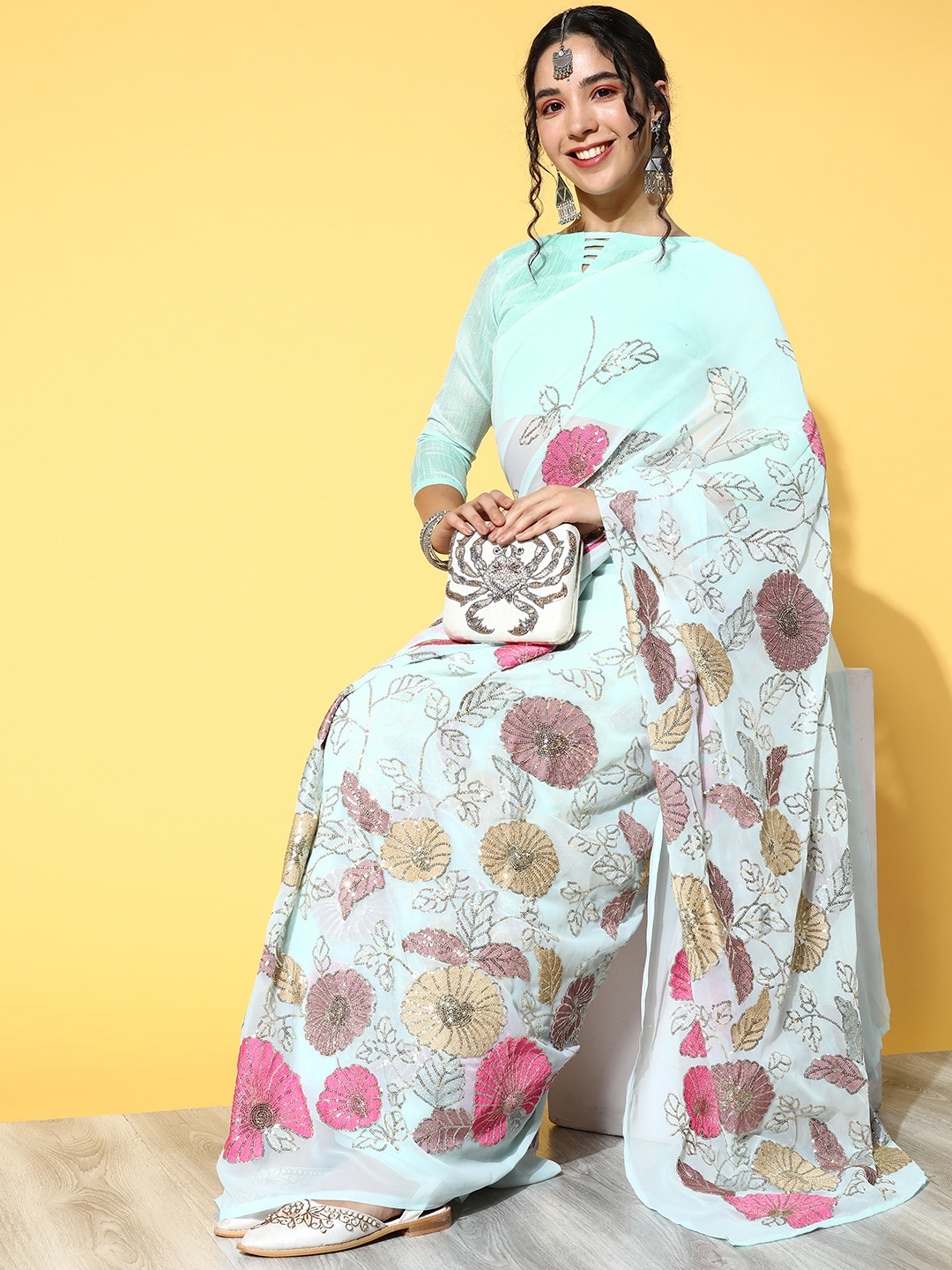 

Mitera Turquoise Blue Floral Pure Georgette Saree
