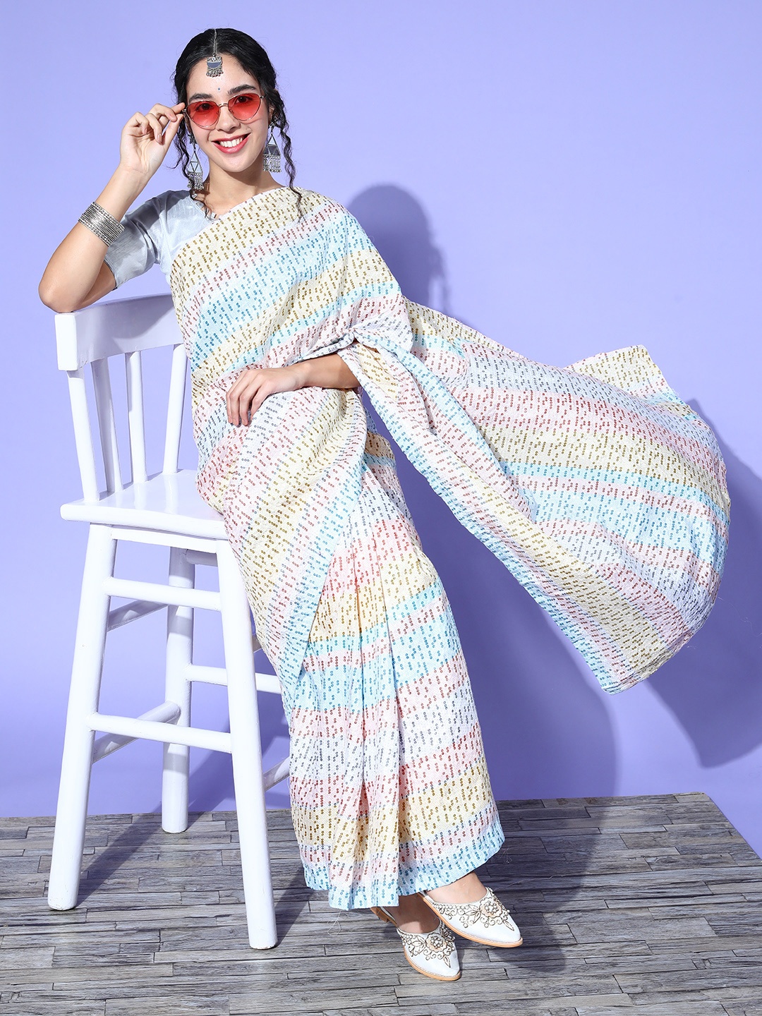 

Mitera Yellow & Blue Pure Georgette Saree