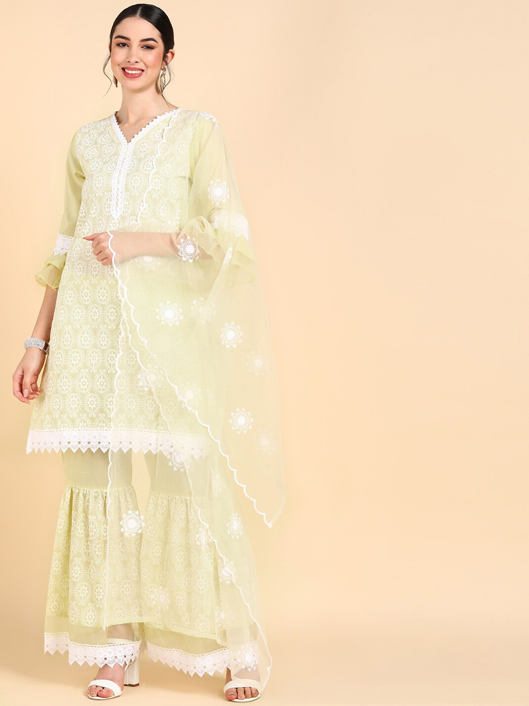 

AHIKA Women Yellow Ethnic Motifs Printed Kurti With Sharara & Dupatta