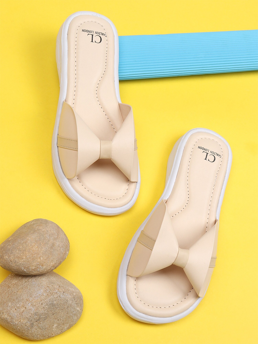 

Carlton London sports Women Beige & White Sliders