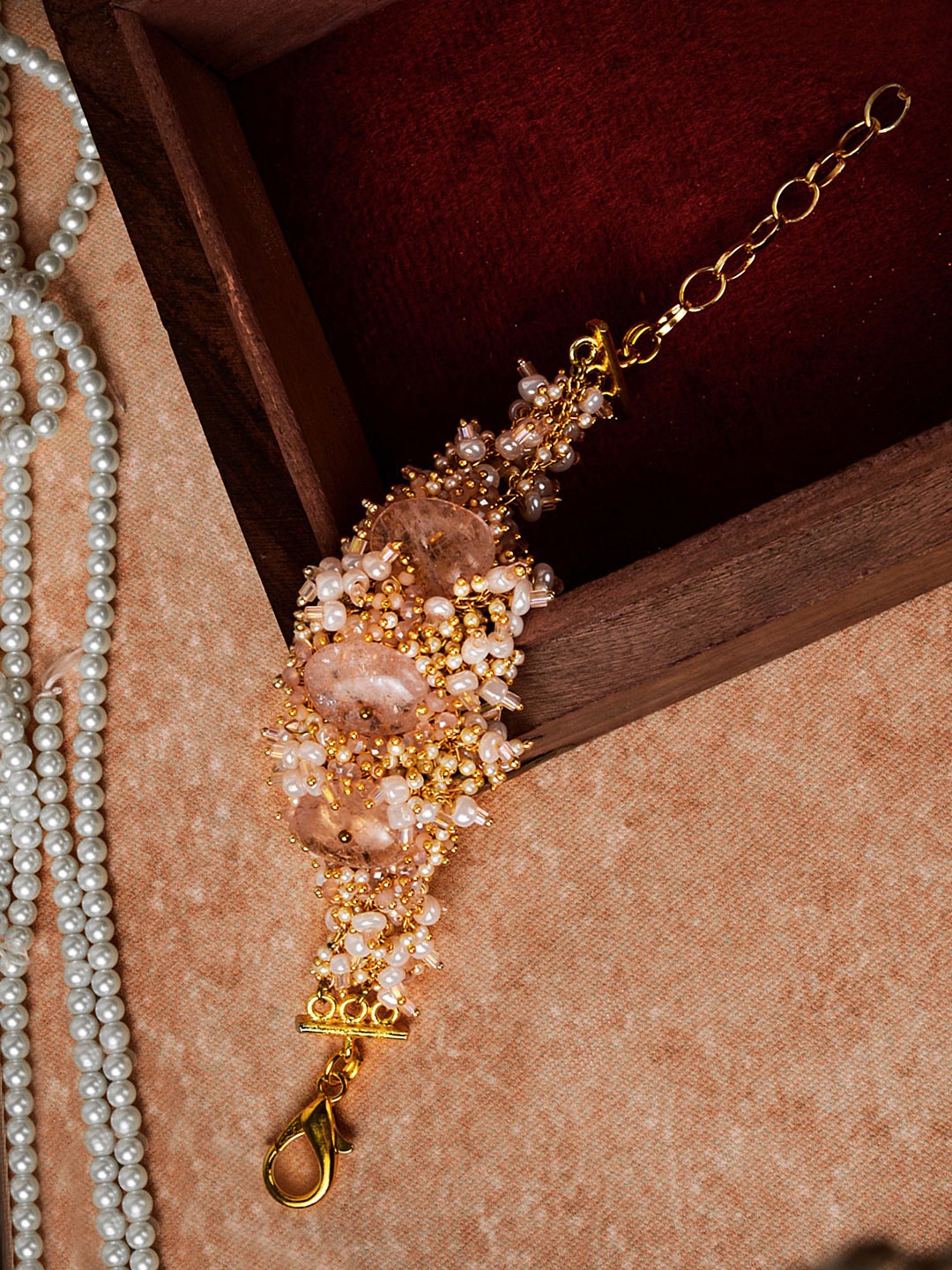 

D'oro Women Gold-Toned & Pink Pearls & Stone studded Bracelet