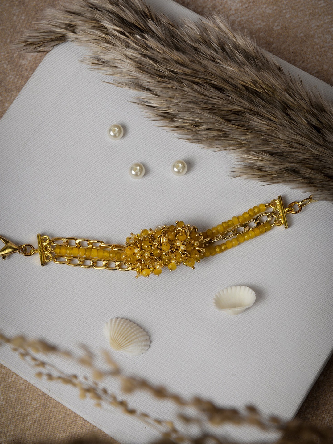 

D'oro Women Gold-Toned & Yellow Handcrafted Gold-Plated Pearl Beaded Bracelet