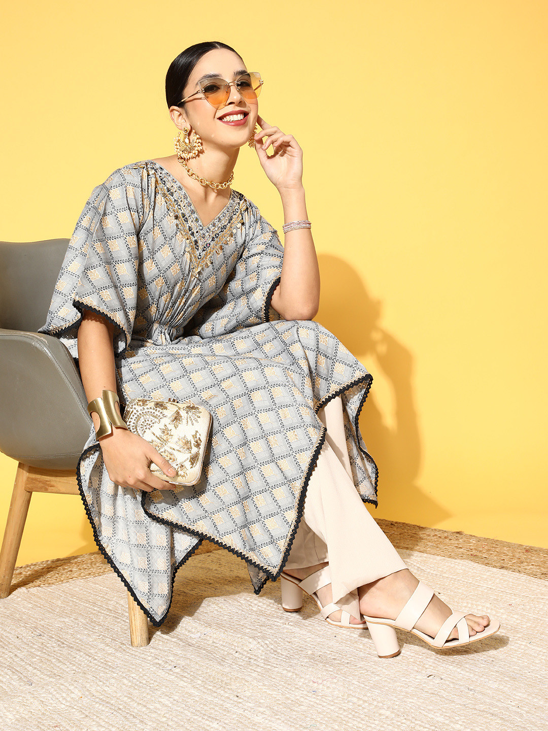 

ZOLA Women Grey & Off White Ethnic Motifs Printed Flared Sleeves Kaftan Kurta