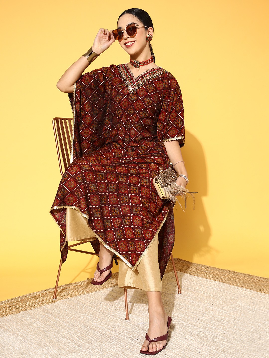 

ZOLA Women Maroon & Green Ethnic Motifs Printed Flared Sleeves Kaftan Kurta