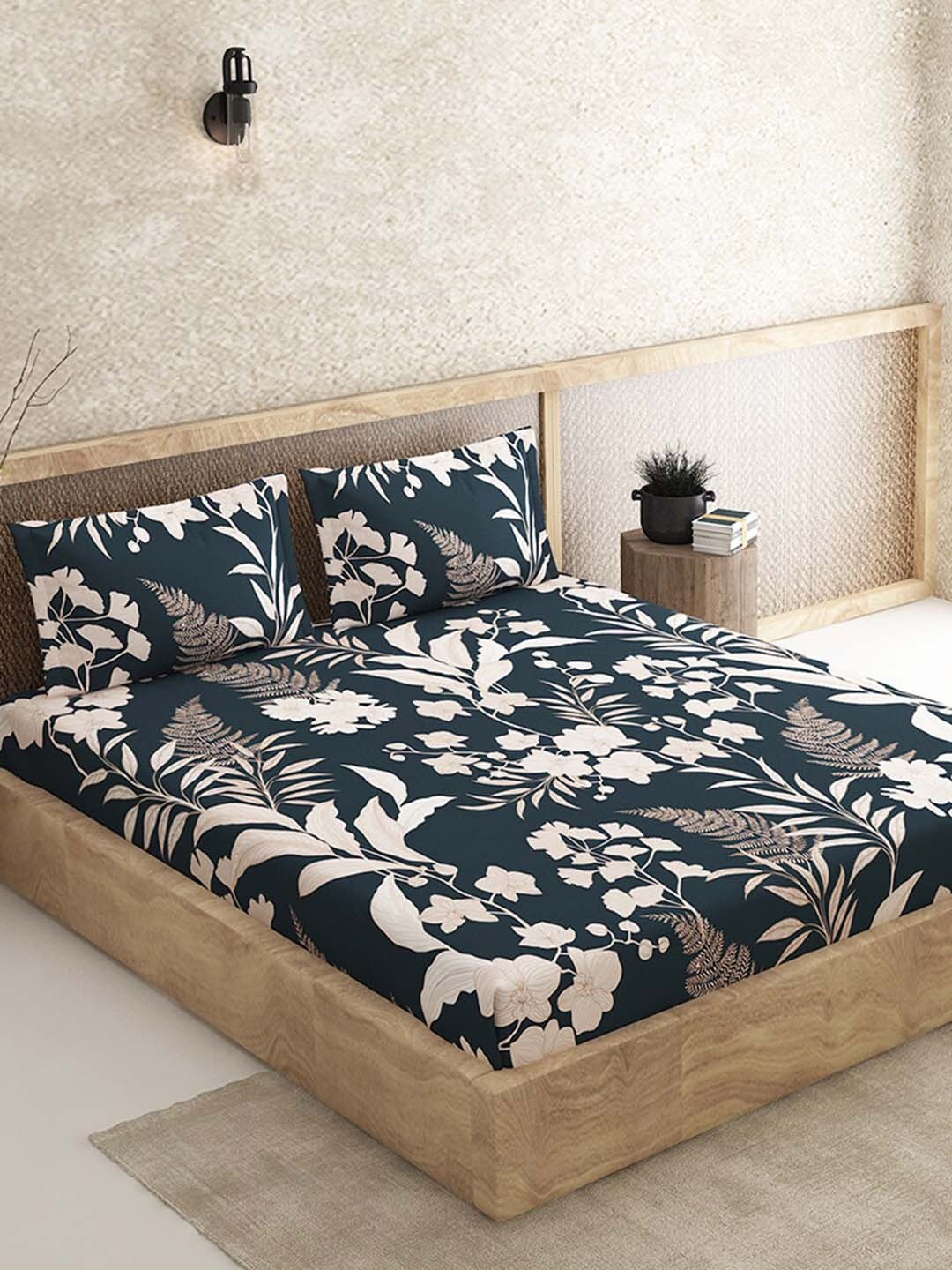 

Duroflex Black & White Floral 210 TC Cotton Queen Bedsheet with 2 Pillow Covers