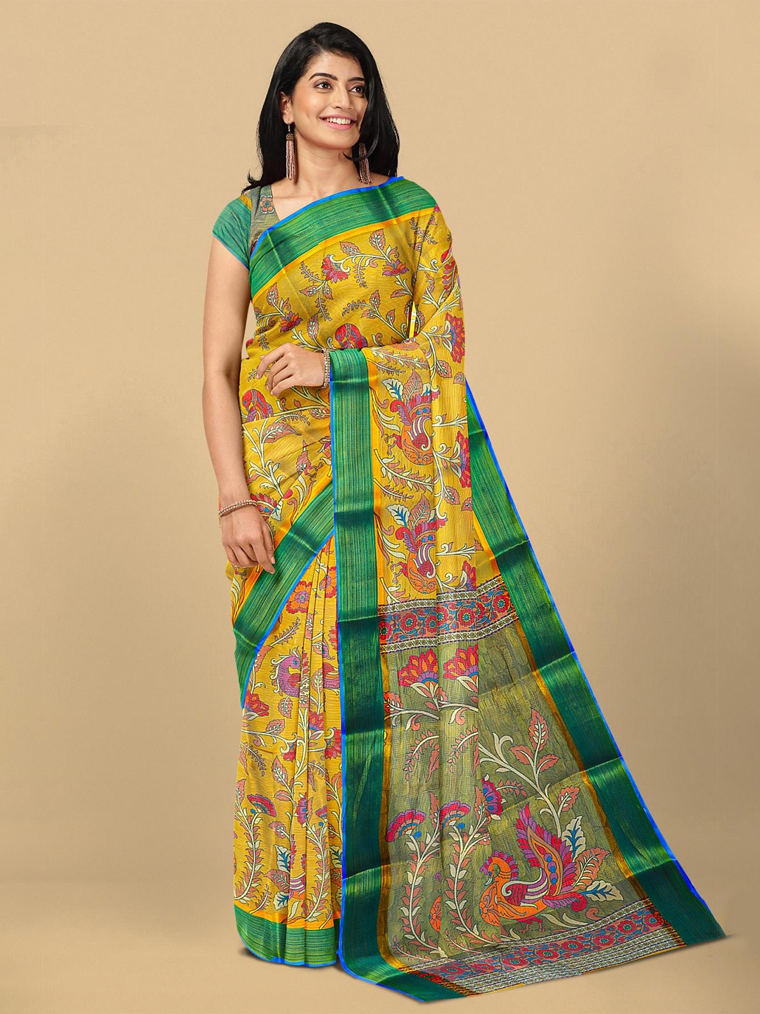 

Kalamandir Mustard Yellow & Green Kalamkari Silk Blend Saree