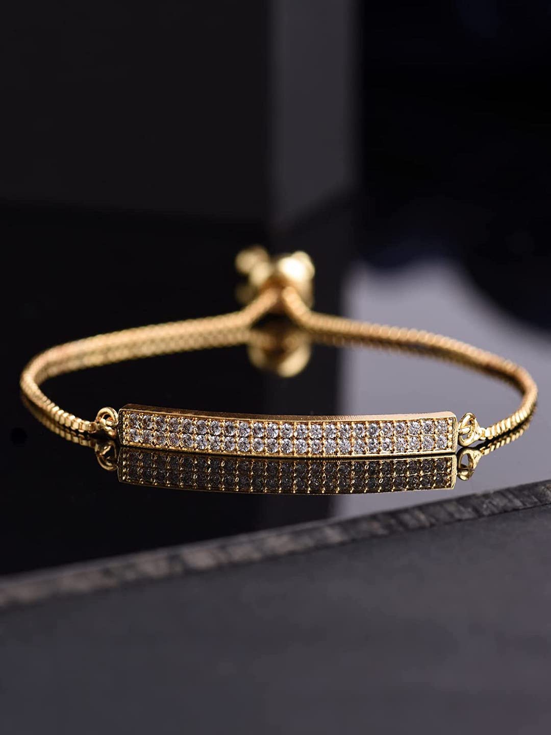

HOT AND BOLD Women Gold-Toned & White Brass American Diamond Gold-Plated Charm Bracelet