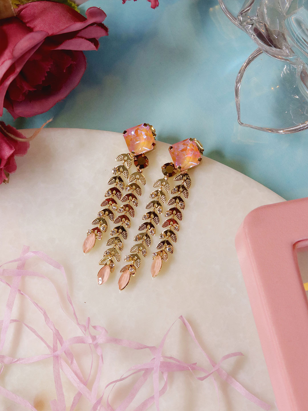 

Ishhaara Pink Leaf Shaped Studs Earrings