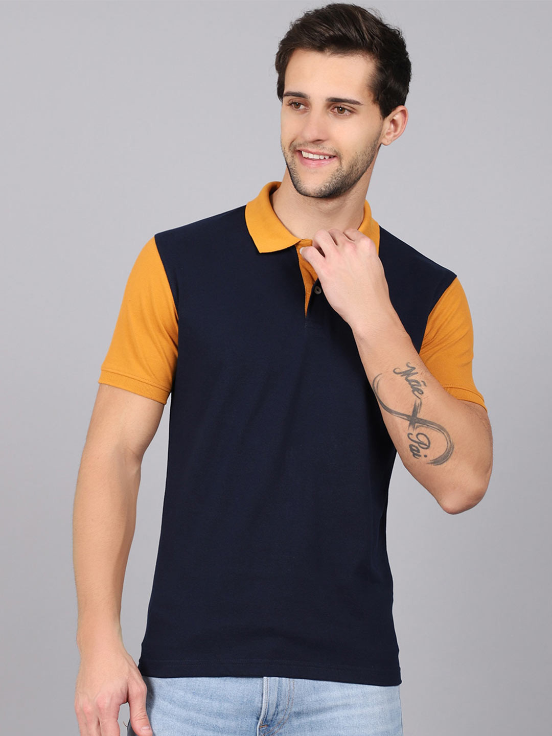 

Cantabil Men Navy Blue & Orange Colourblocked Polo Collar T-shirt