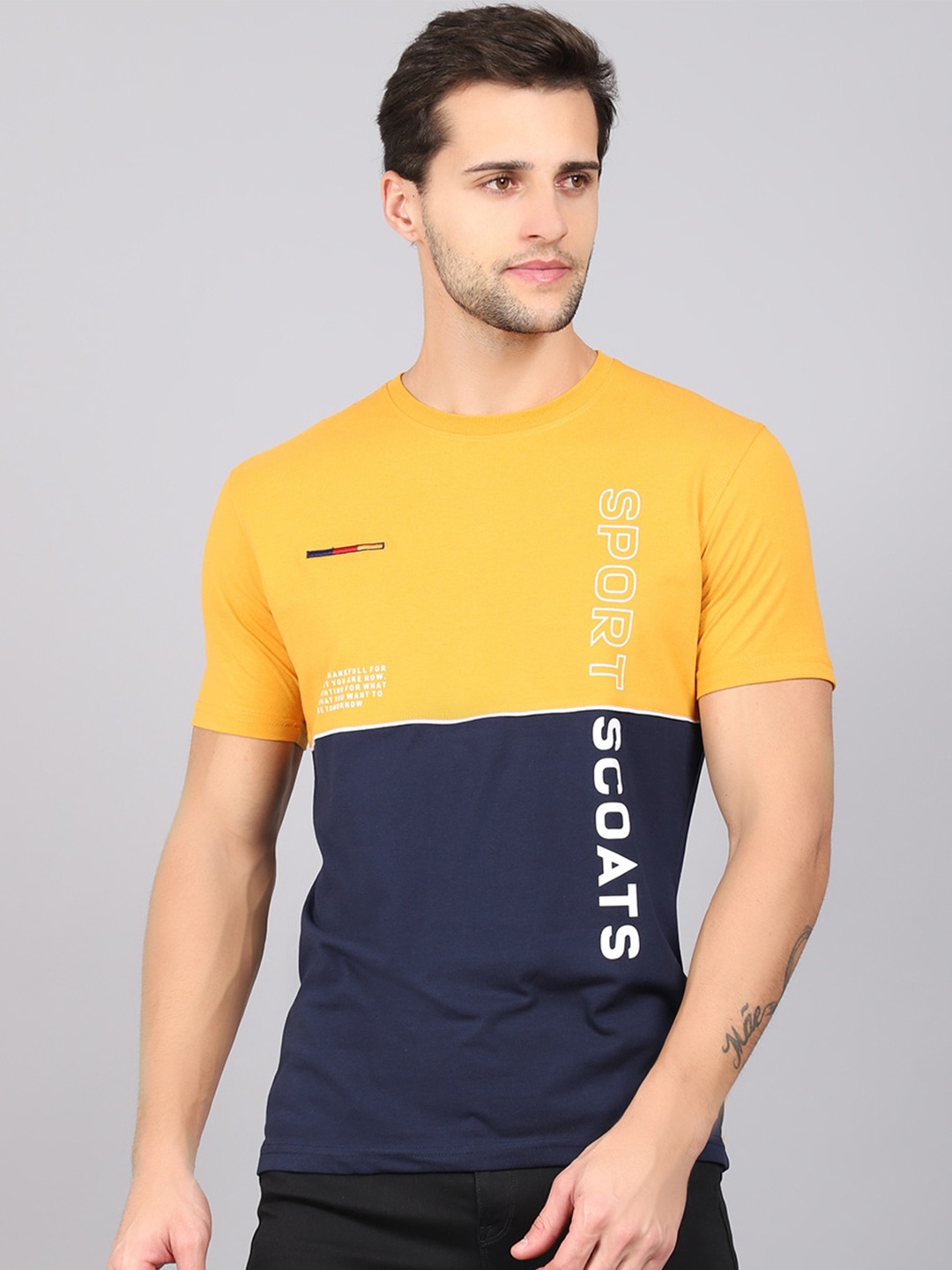 

Cantabil Men Mustard Yellow & Navy Blue Colourblocked T-shirt