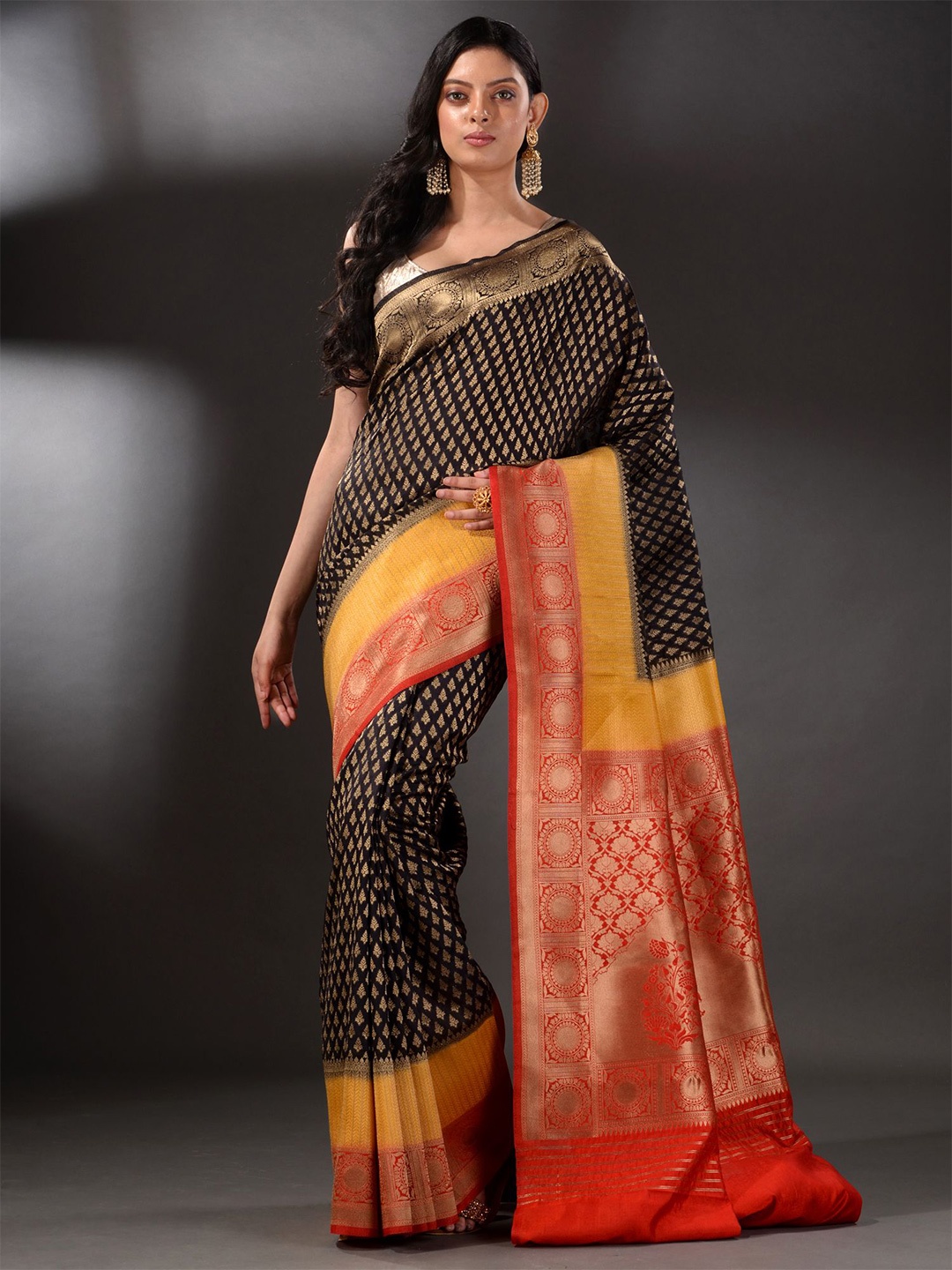 

Arhi Black & Yellow Ethnic Motifs Zari Brocade Saree