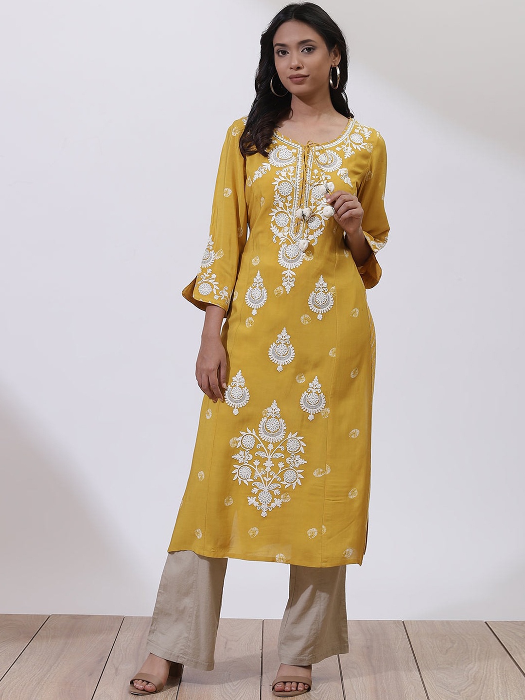 

Lakshita Women Mustard Yellow Floral Printed Keyhole Neck Flared Sleeves Thread Work Kaftan Kurta