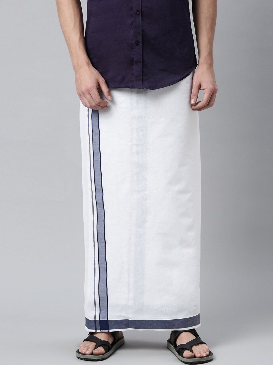 

Jansons Men White Solid Dhotis