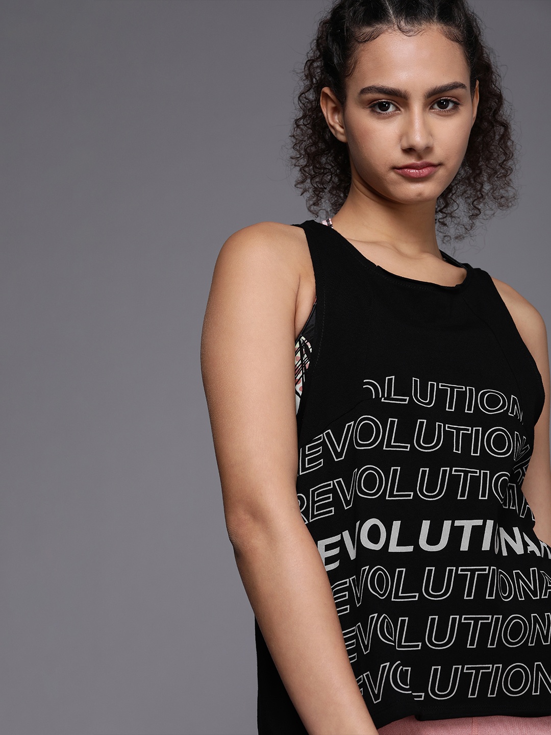 

Allen Solly Woman Black Tribe Printed Raw Edge Hem Tank Top