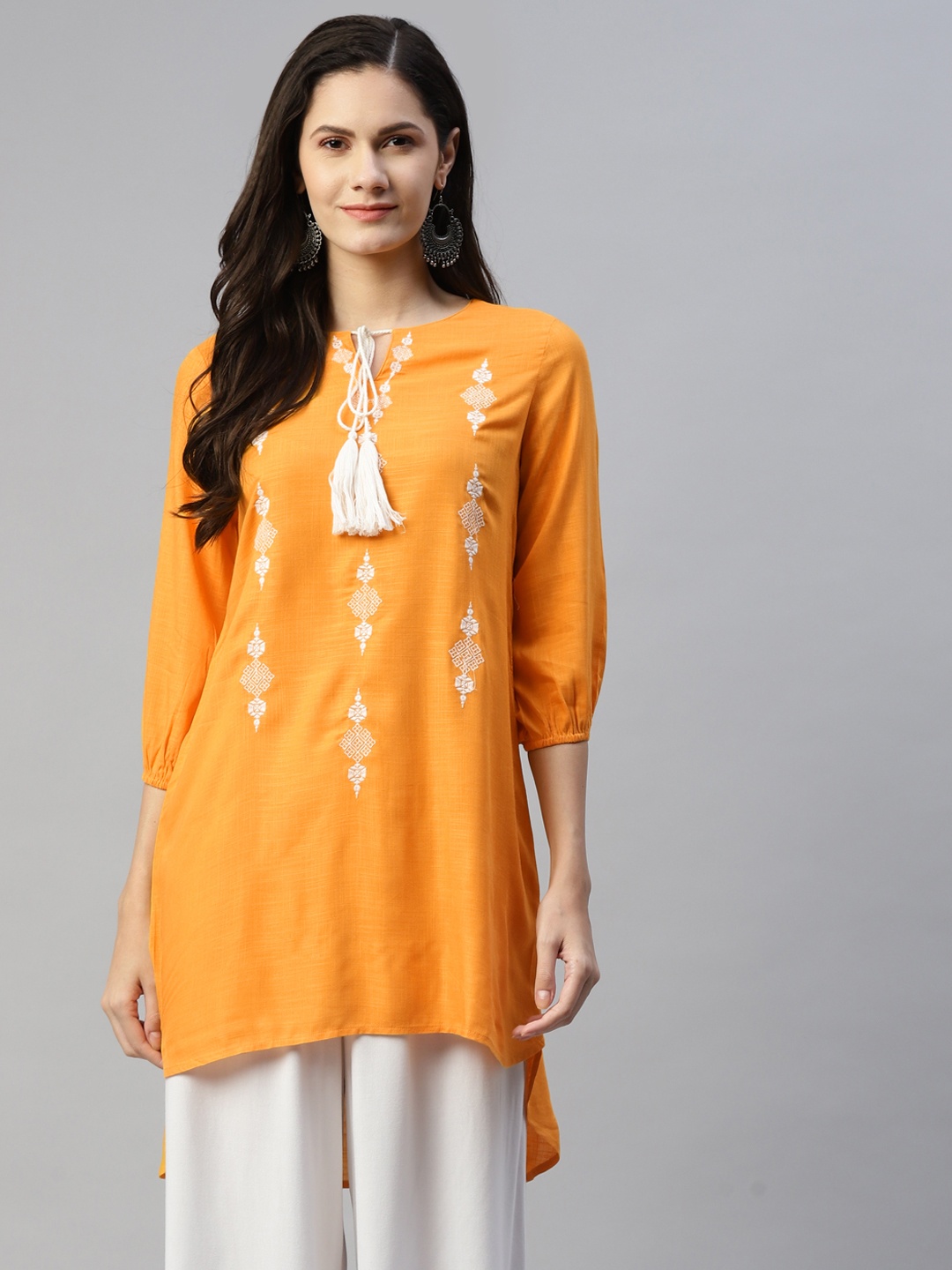 

MALHAAR Yellow & White Ethnic Motifs Embroidered Thread Work Thread Work Kurti