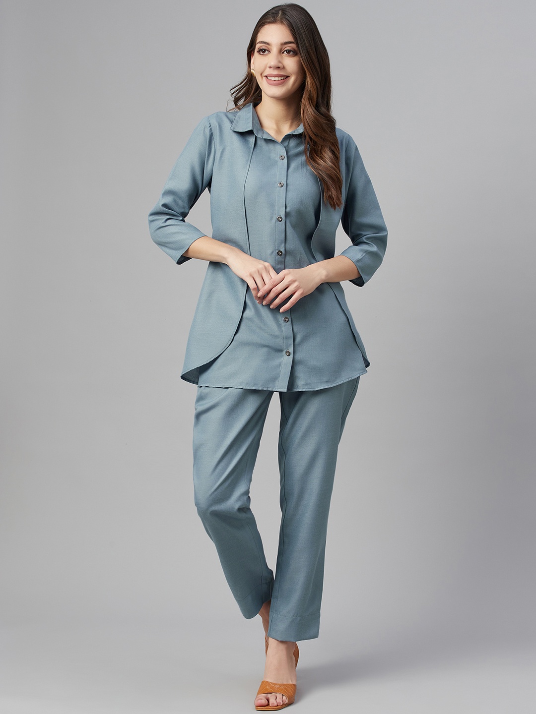 

Cottinfab Women Blue Solid Shirt with Trousers