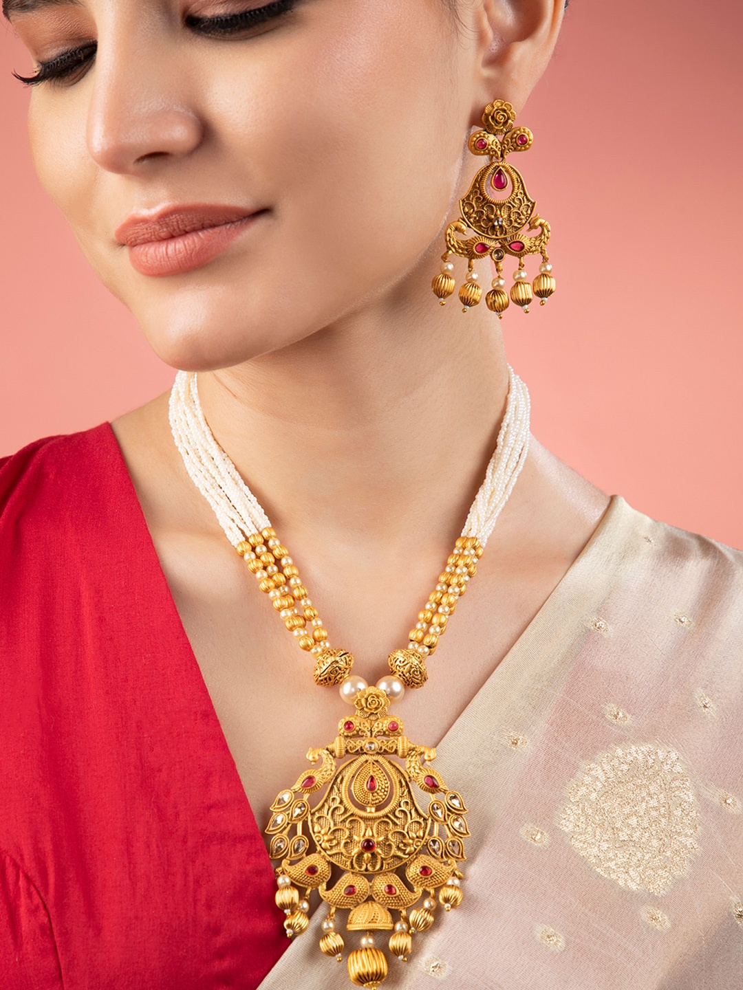 

Rubans 24K Gold Plated Ruby Studded Golden & Pearl Beaded MultiStrand Temple Jewellery Set