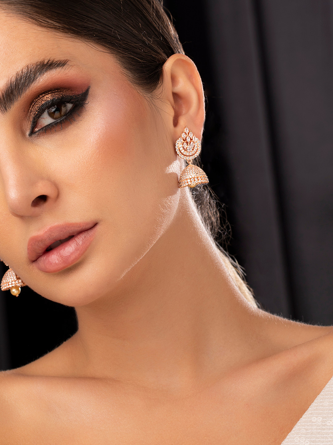 

Rubans Rose Gold Plated AD Studded Dome Shaped Jhumkas Earrings