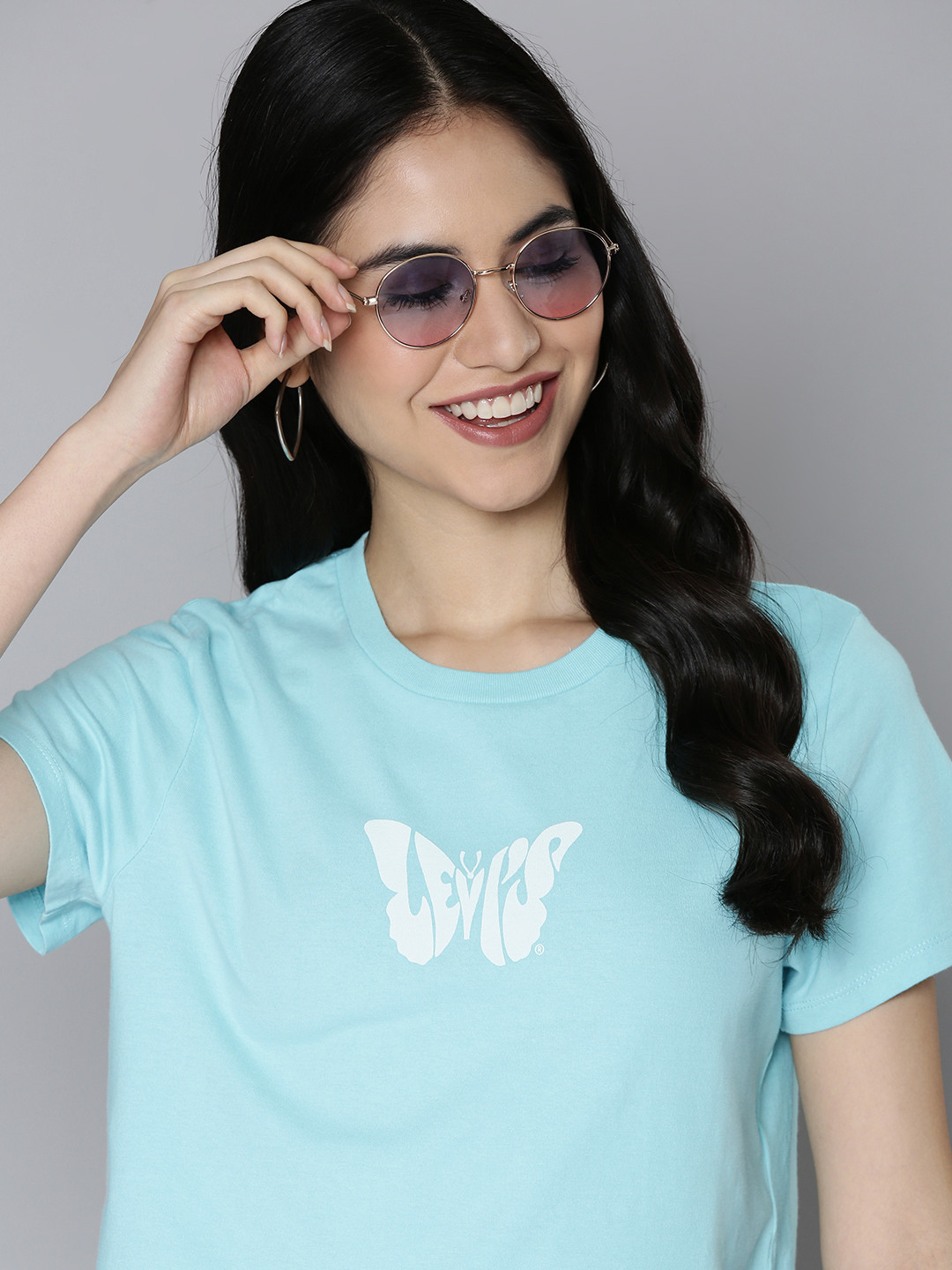 

Levis Women Blue & White Printed Pure Cotton Slim Fit T-shirt