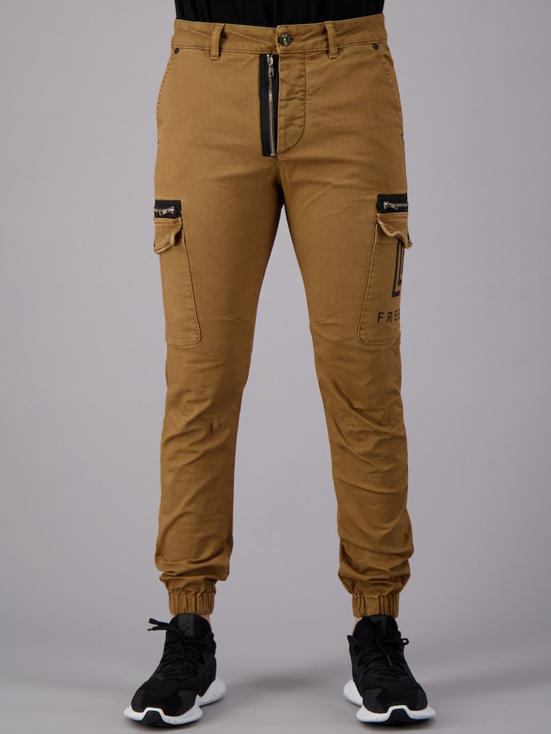 

FREESOUL Men Beige Solid Cargos Trousers