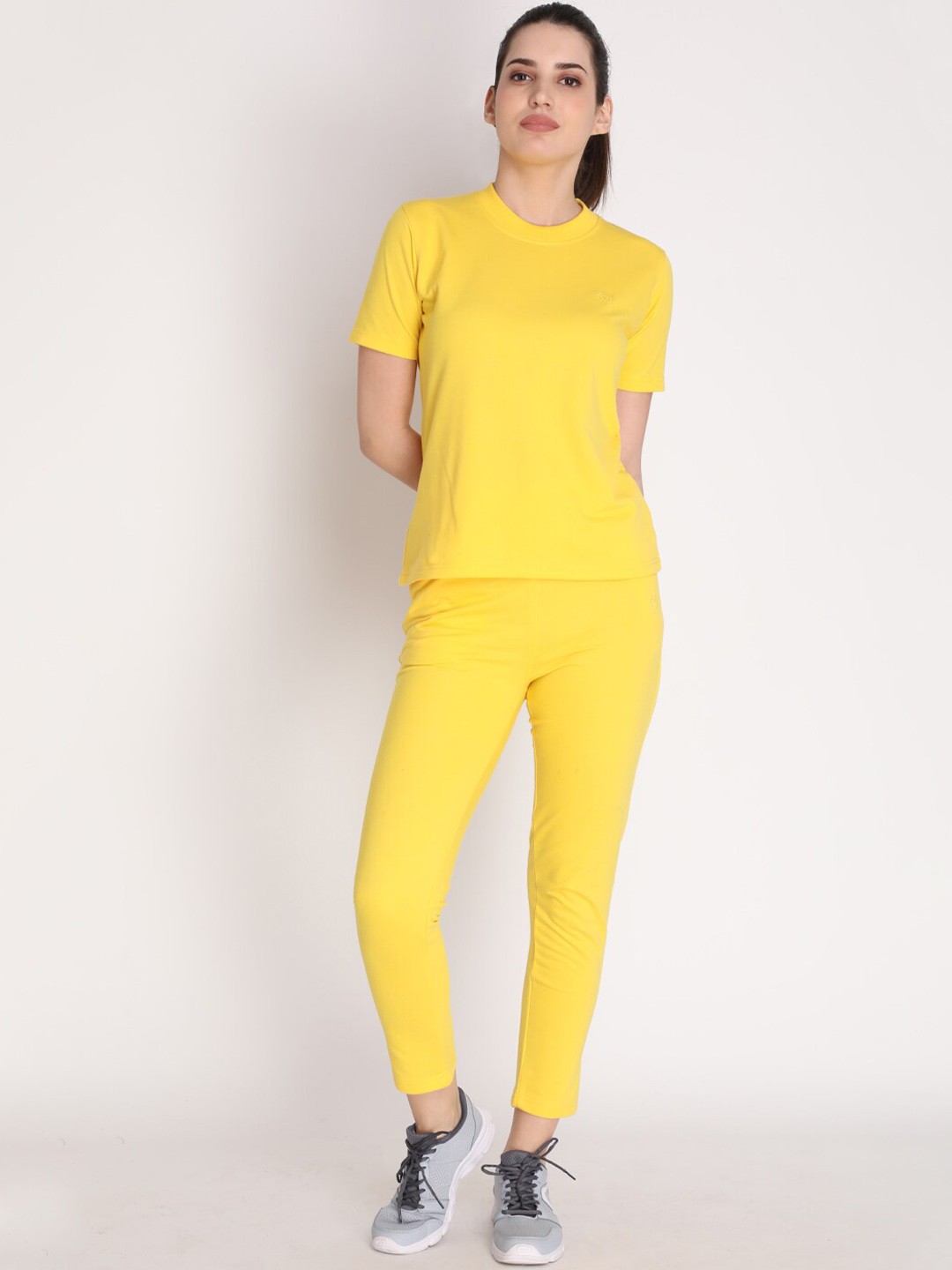 

CHKOKKO Women Yellow Solid T-Shirt with Trousers