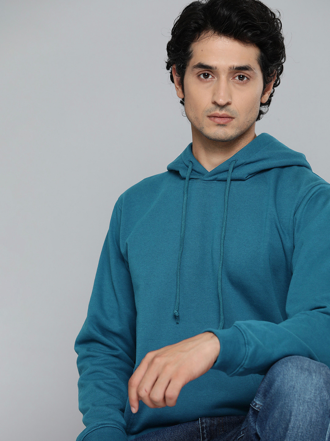

ether Men Teal Blue Solid Hooded Sweatshirt