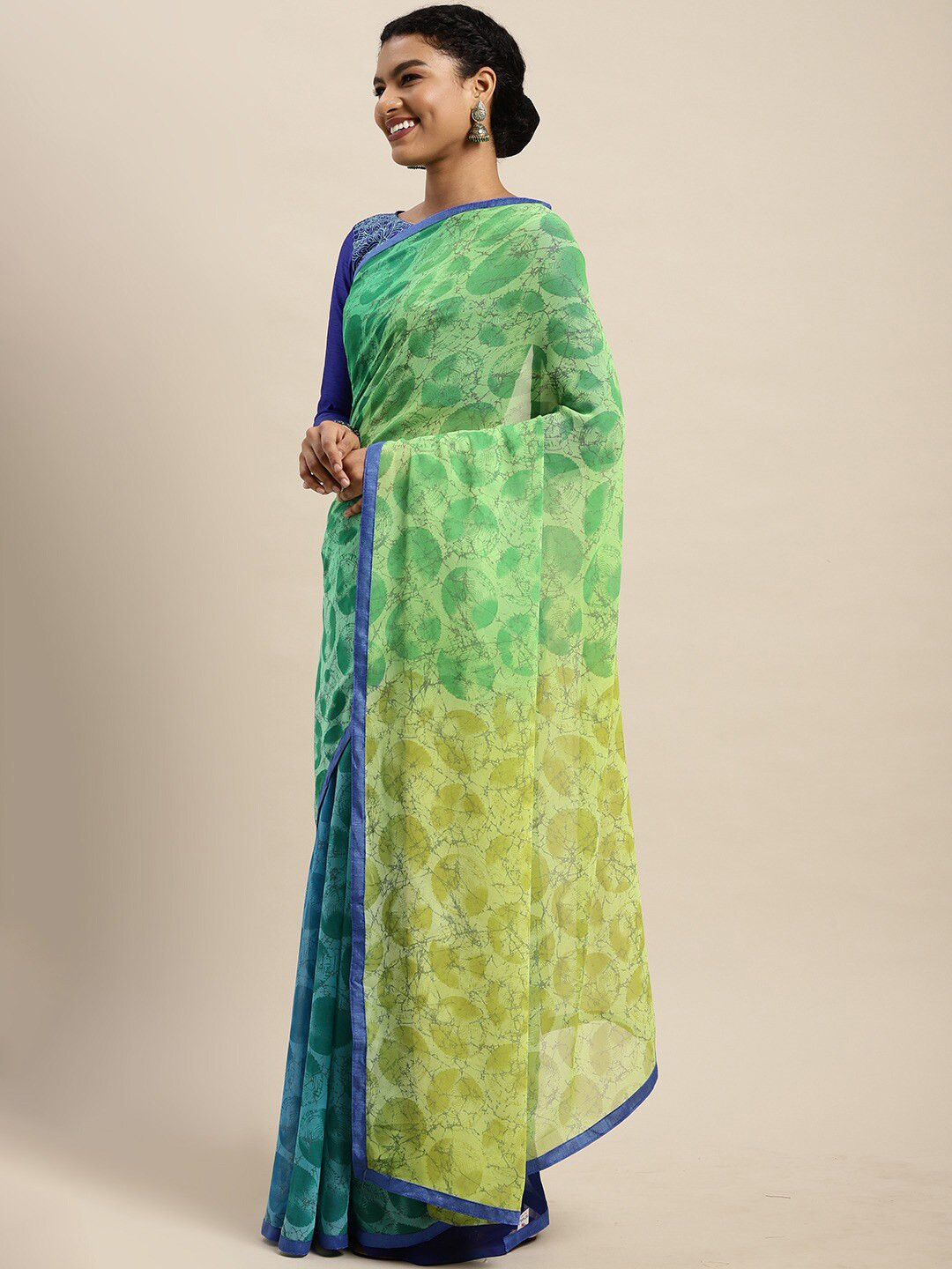 

Shaily Green & Blue Printed Pure Georgette Saree