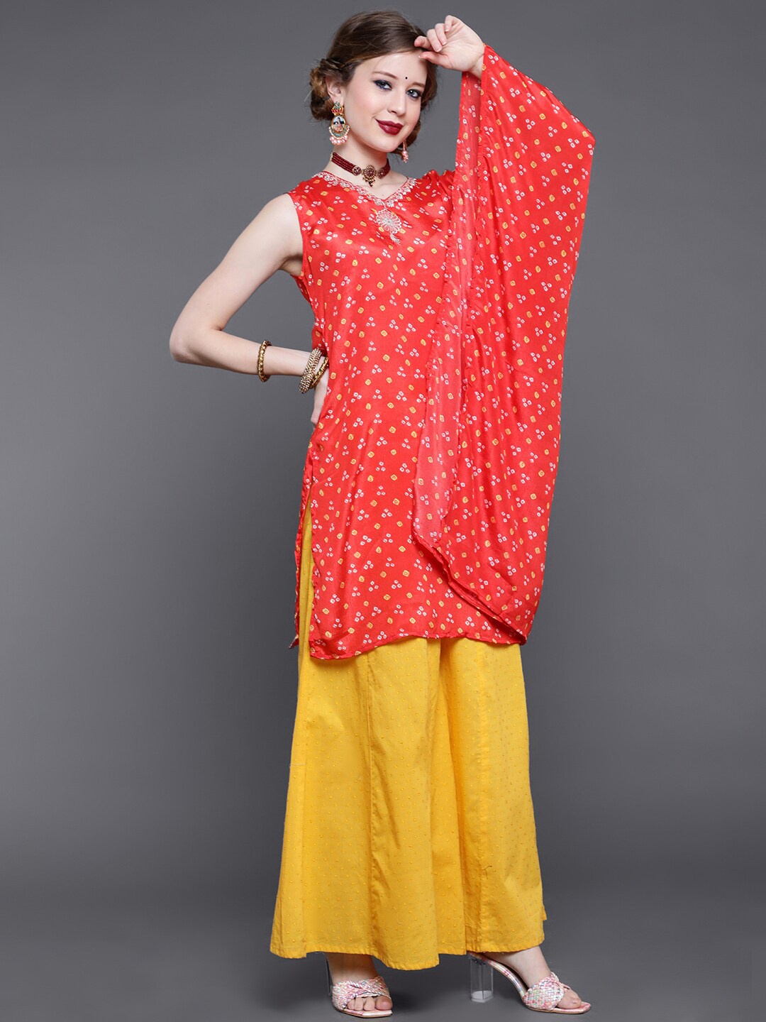 

saubhagya Women Orange Ethnic Motifs Printed Thread Work Kurta