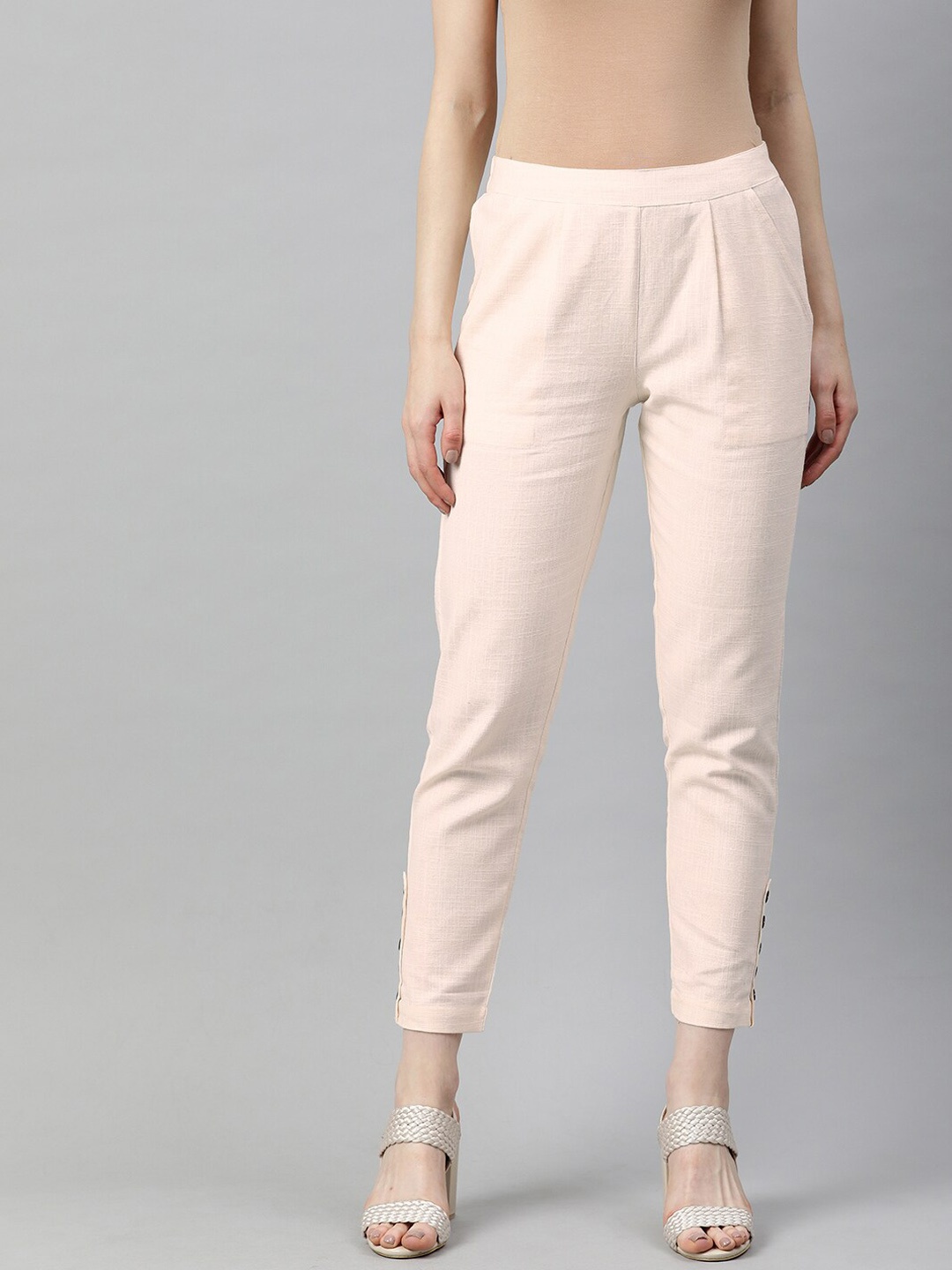 

Jaipur Kurti Women Off White Solid Cotton Straight Fit Trousers