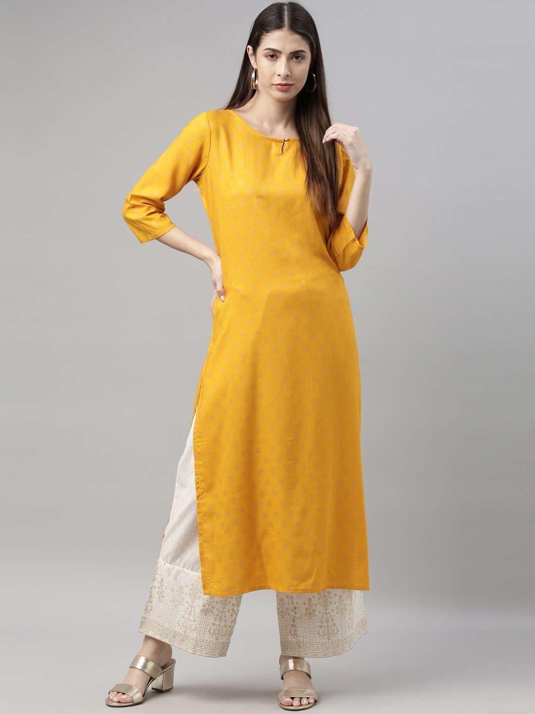 

Marcia Women Yellow Ethnic Motifs Printed Kurta With Palazzos