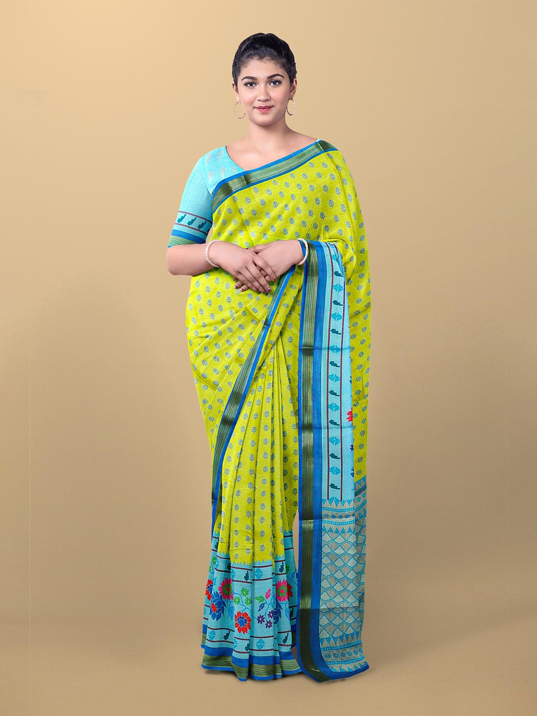 

Kalamandir Yellow & Blue Floral Zari Silk Blend Saree