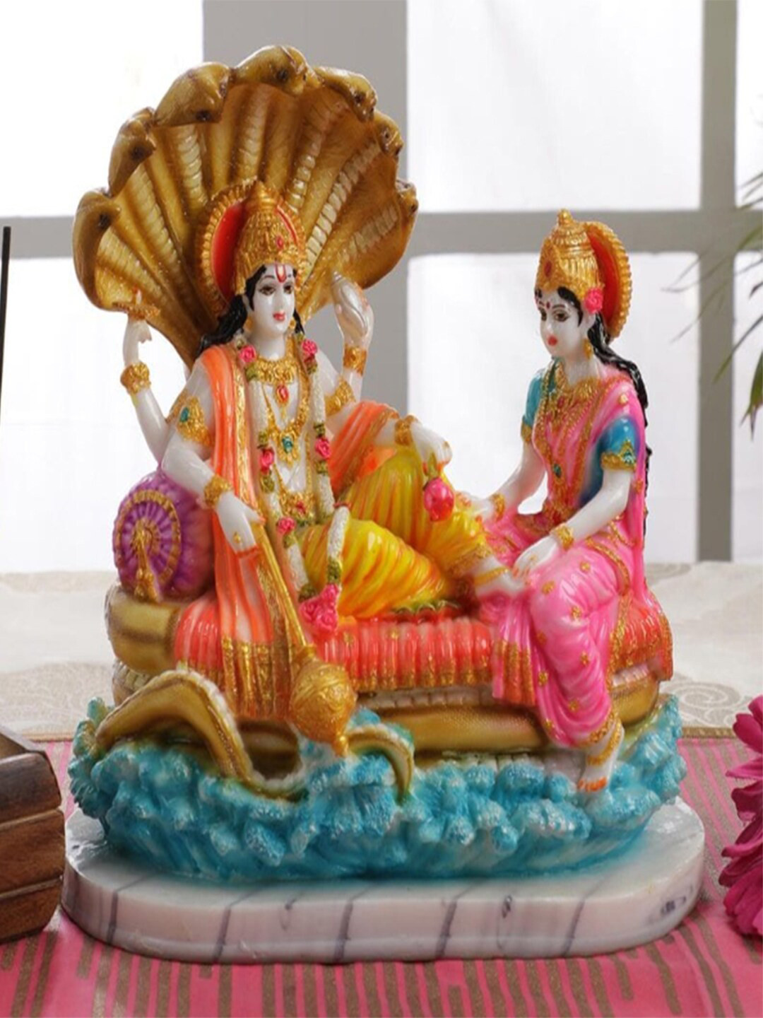 

Gallery99 Orange & White Vishnu Laxmi Show piece