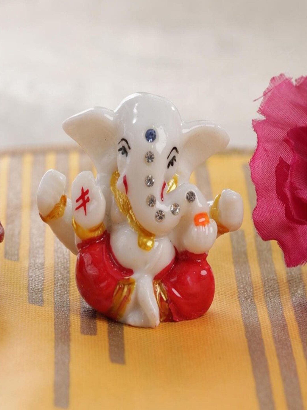 

Gallery99 White & Orange Lord Ganpati Idol Showpiece