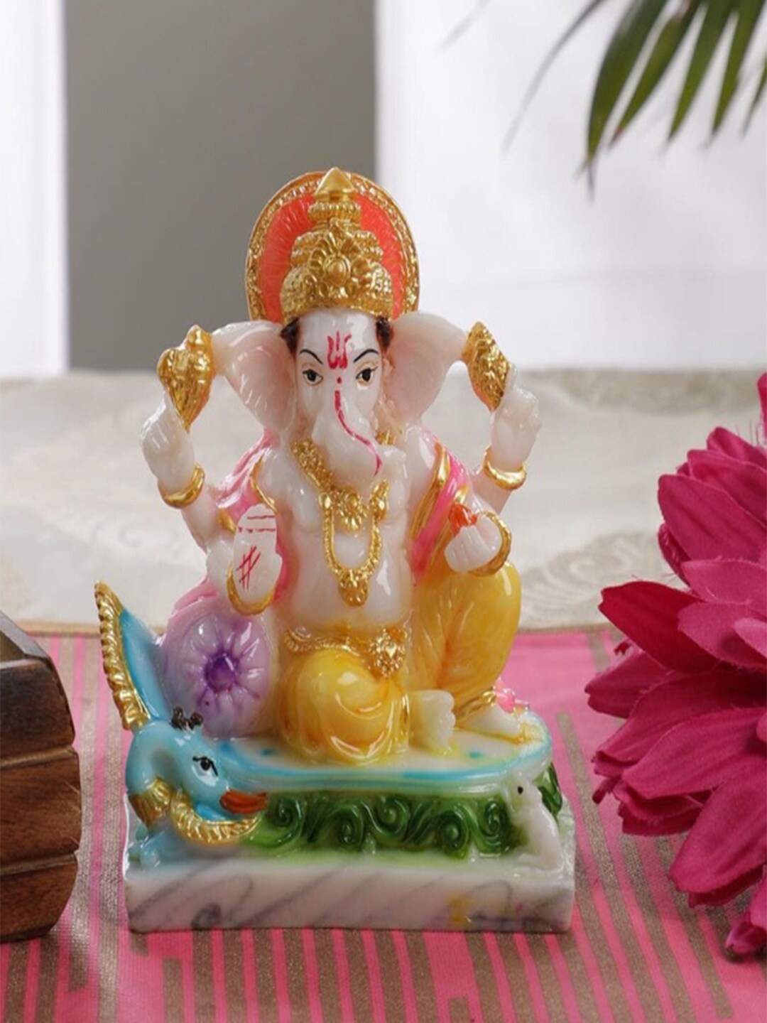 

Gallery99 White & Yellow Lord Ganpati Idol Show piece