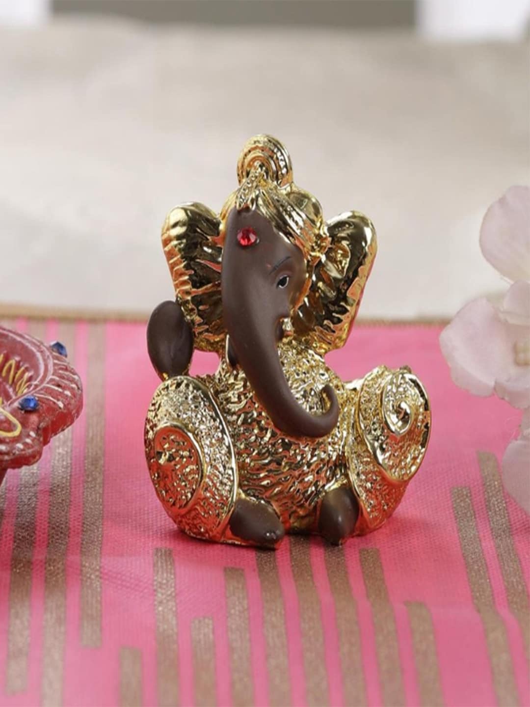 

Gallery99 Gold-Toned & Brown Handpainted Lord Ganpati Showpiece