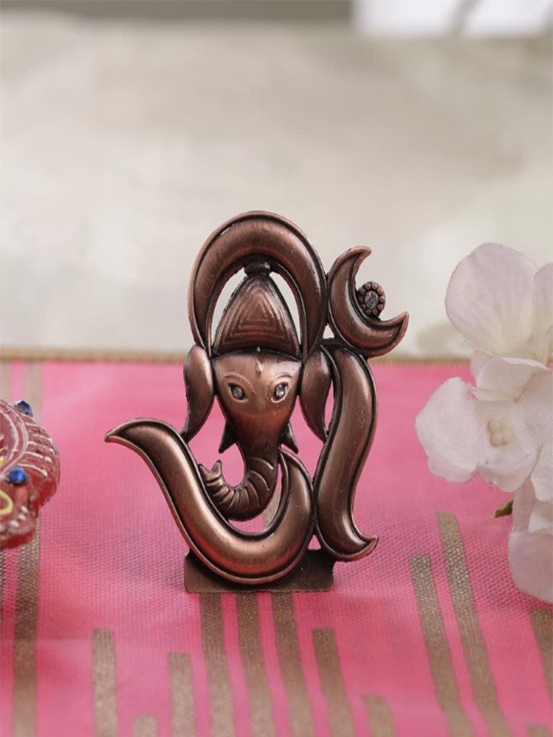 

Gallery99 Metallic-Toned Ganpati Idol Showpiece