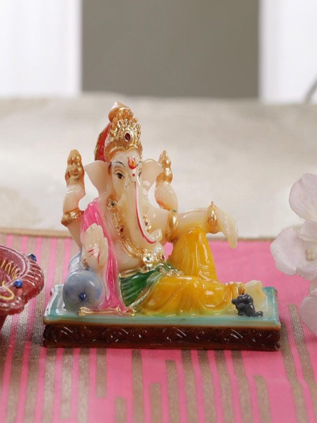 

Gallery99 Yellow & Blue Handpainted Lord Ganpati Idol Showpiece
