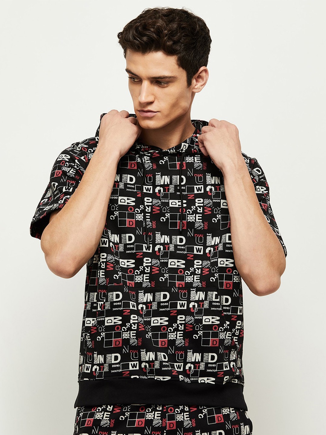

max Men Black Typography Printed T-shirt