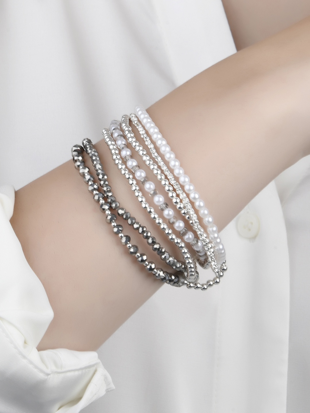 

Lilly & sparkle Women Set Of 7 Silver-Plated Stretchable Bracelets