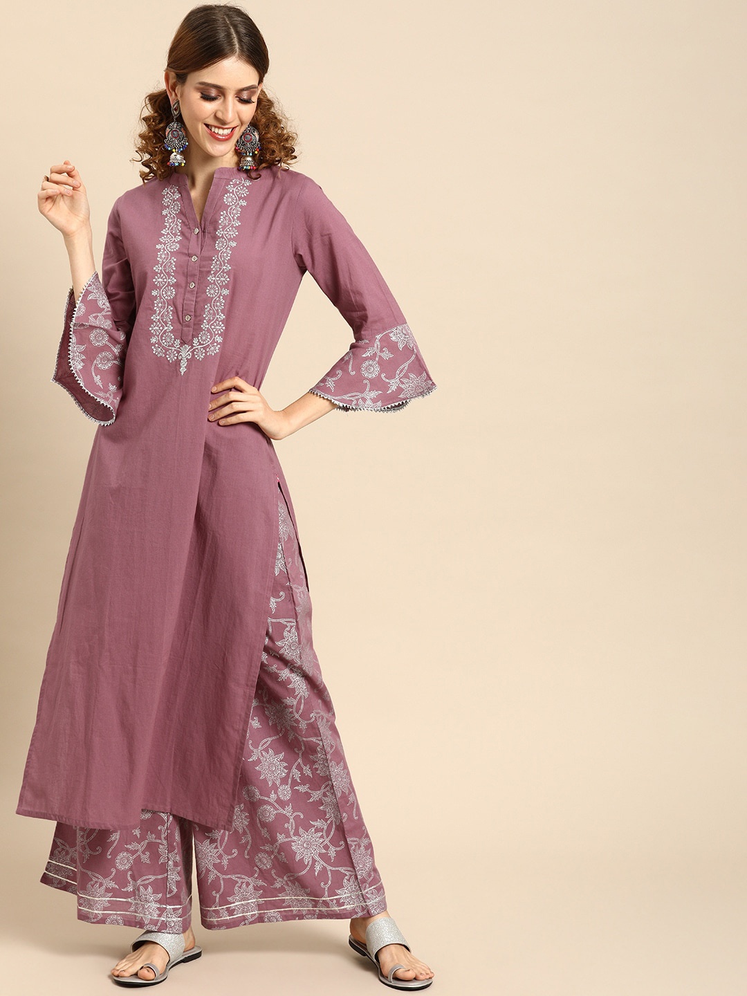 

Varanga Women Mauve Floral Printed Kurta with Palazzos