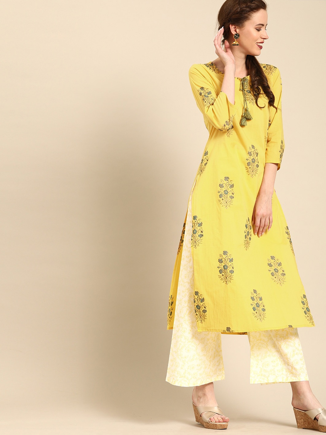 

Varanga Women Mustard Yellow Floral Printed Sequinned Pure Cotton Kurta with Palazzos