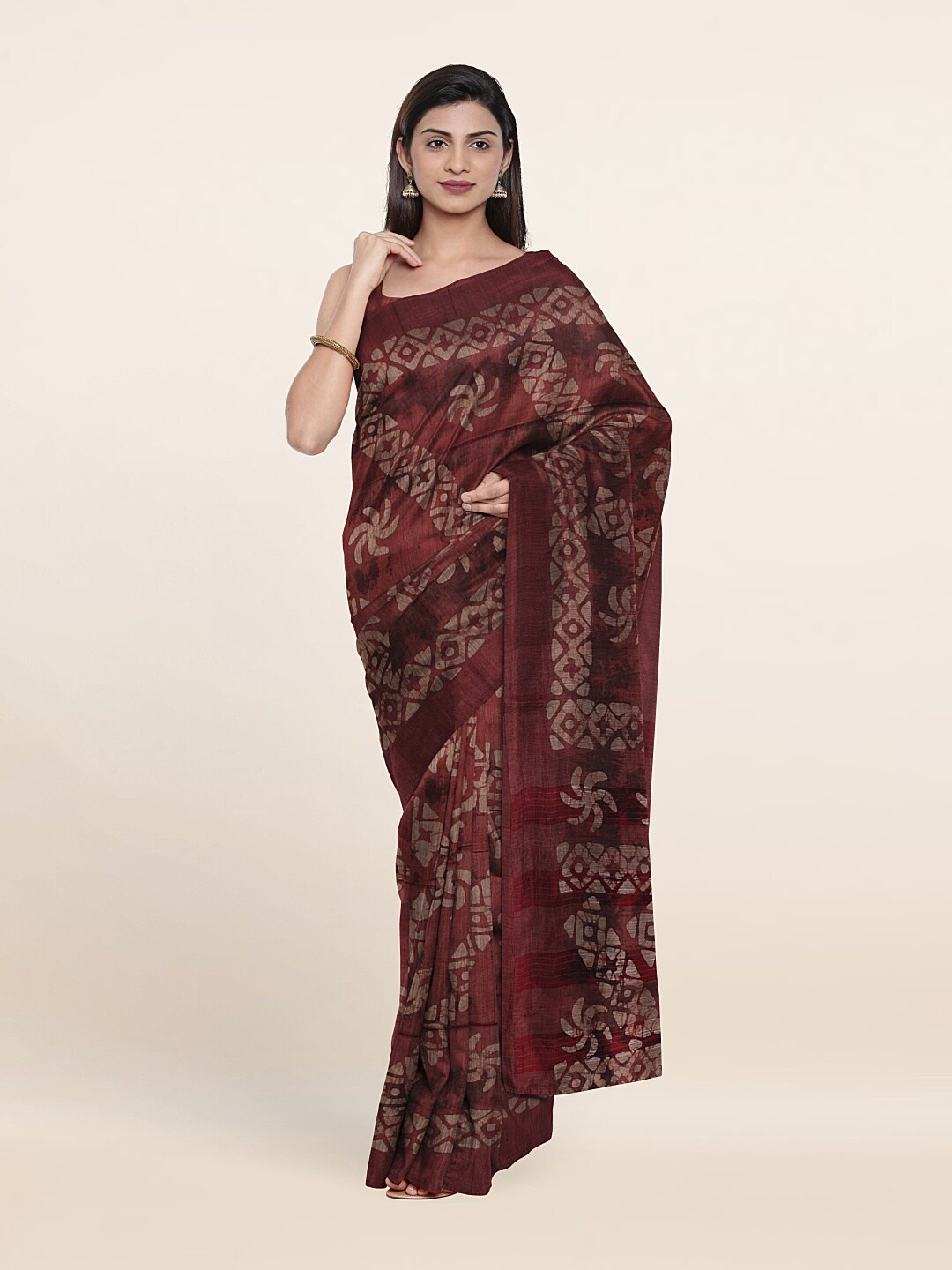 

Pothys Rust Batik Print Jute Cotton Saree