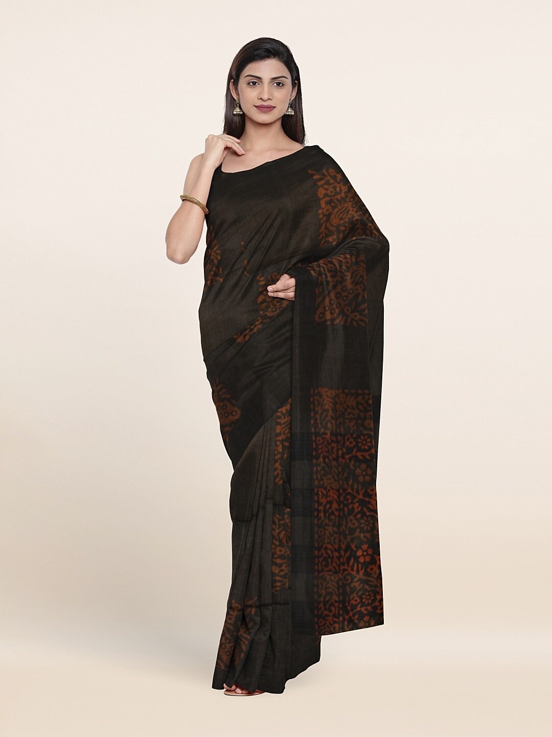 

Pothys Olive Green & Orange Floral Jute Cotton Saree