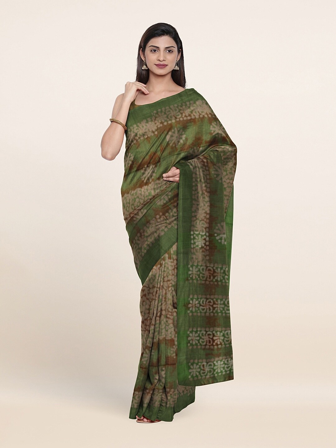 

Pothys Green & Brown Floral Jute Cotton Saree