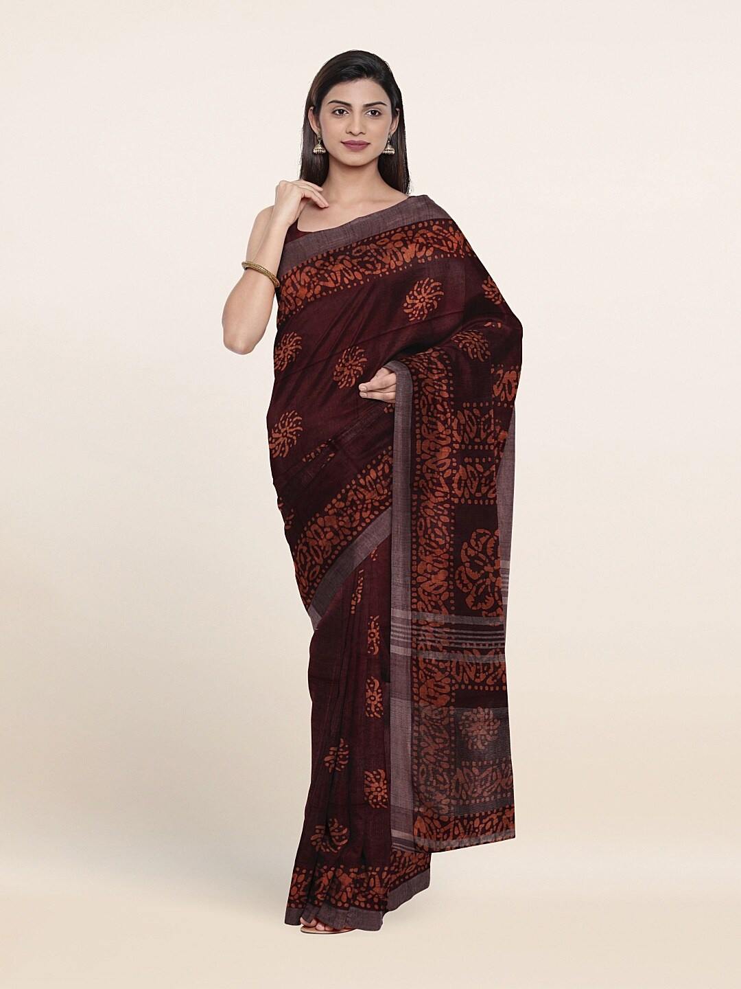 

Pothys Maroon & Silver-Toned Floral Zari Jute Cotton Saree