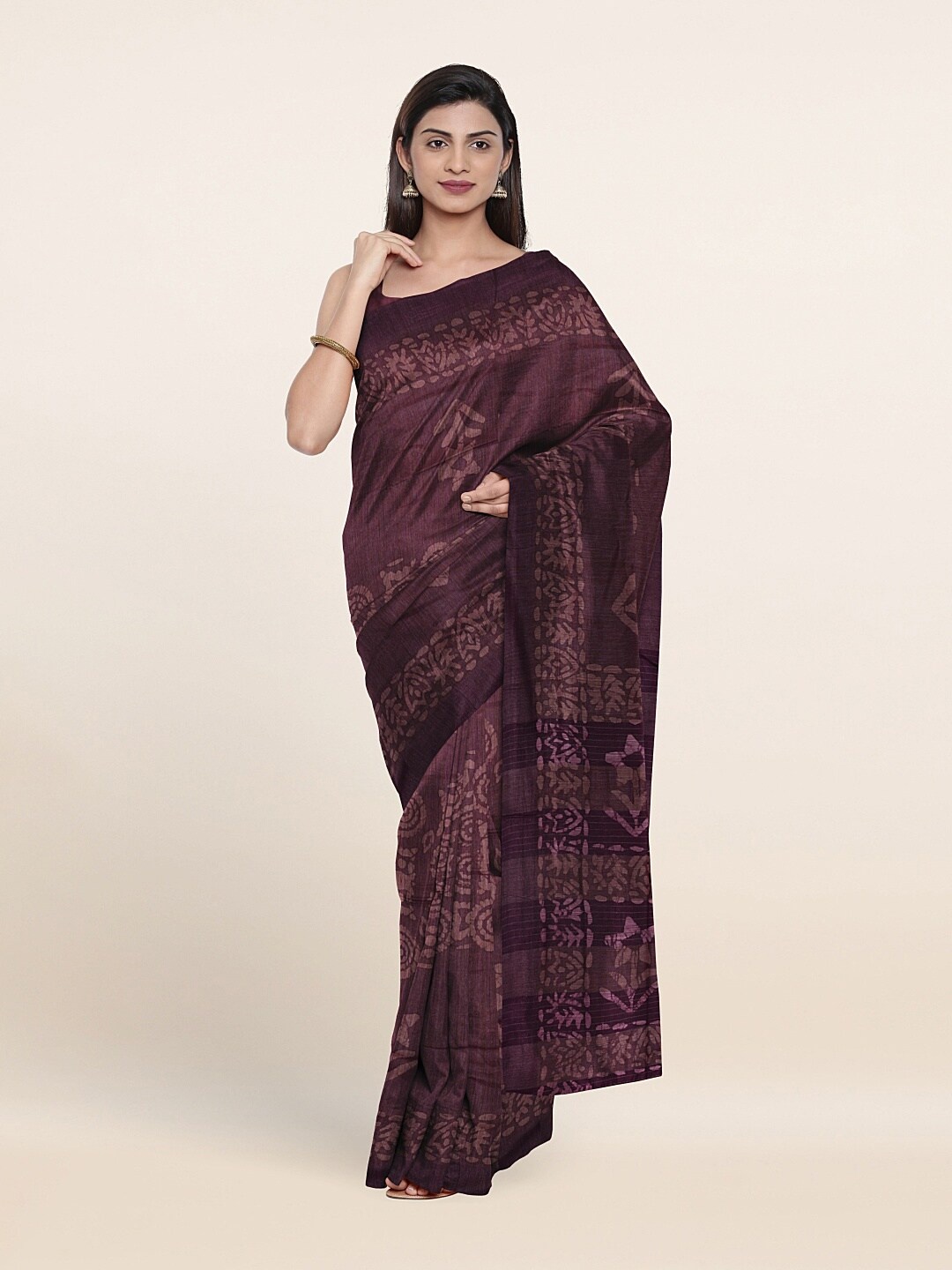 

Pothys Purple & White Floral Jute Cotton Saree