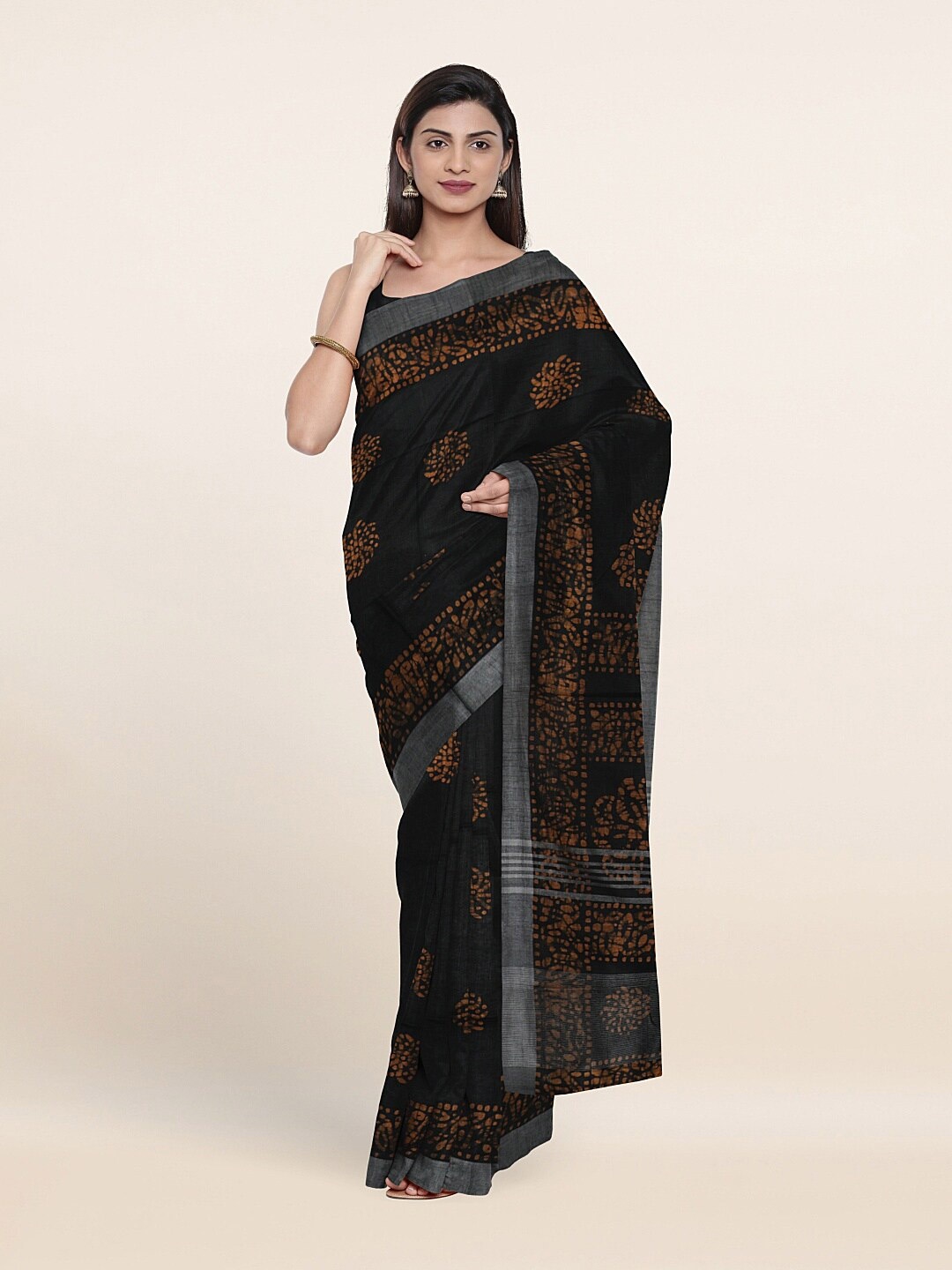 

Pothys Black & Brown Floral Zari Jute Cotton Saree