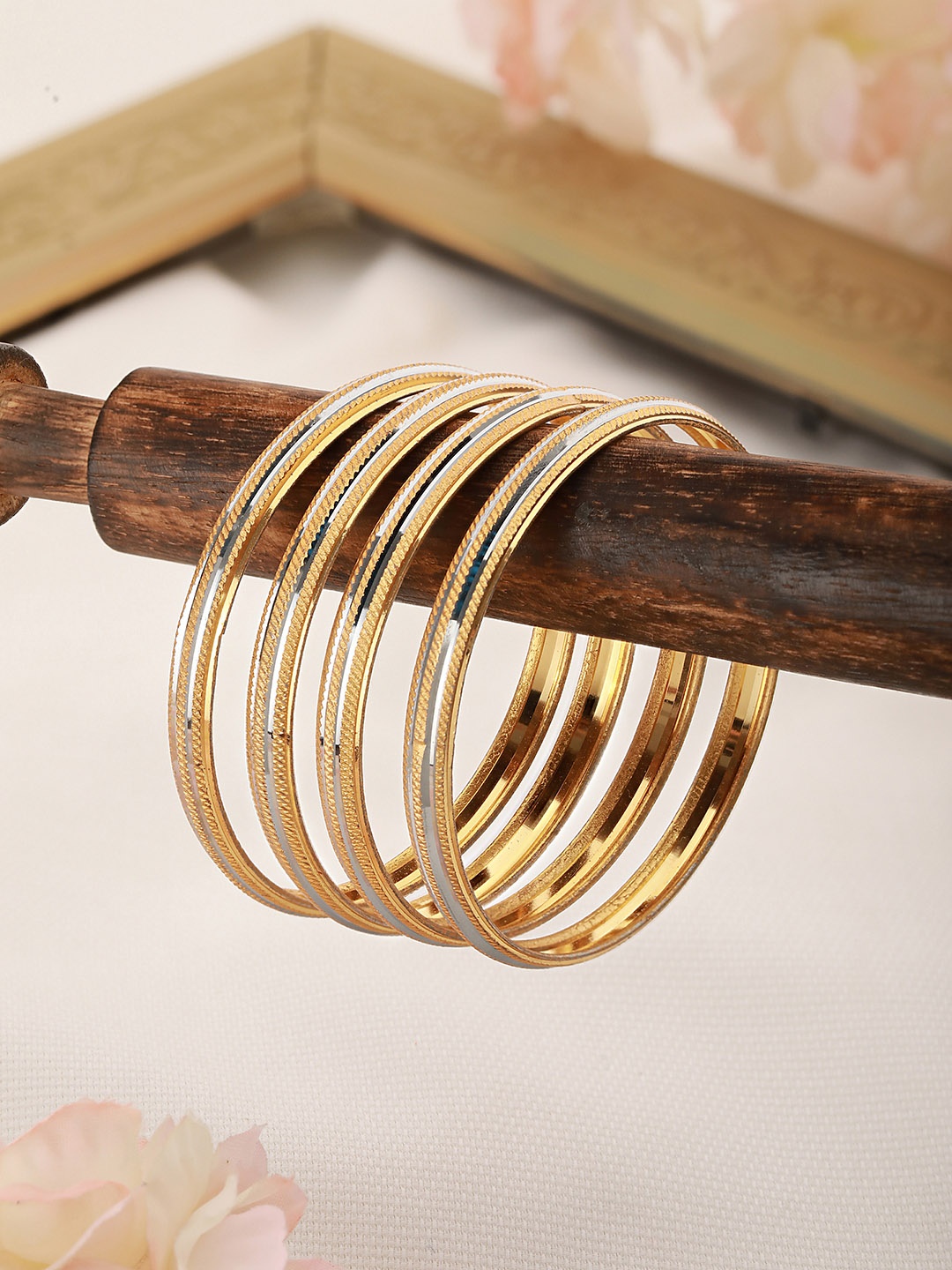 

Saraf RS Jewellery Set of 4 Gold-Plated White AD-Studded Handcrafted Bangles